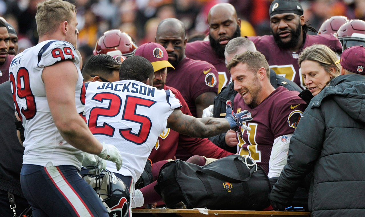 alex-smith-is-comforted-by-texans-players-after-injury