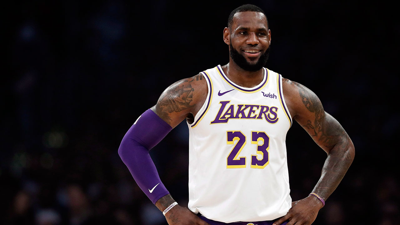 lebron-james-laughs-as-he-looks-on