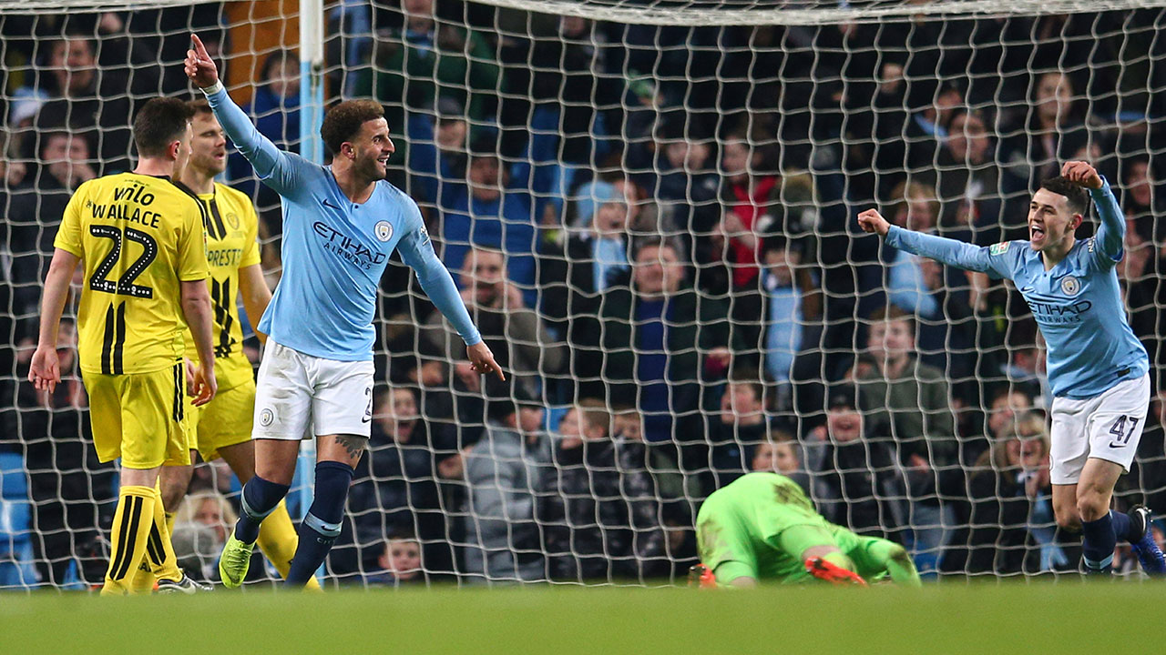 ManCity_Riyad_Mahrez_Celebrates_With_Phil_Foden_English_League_Cup