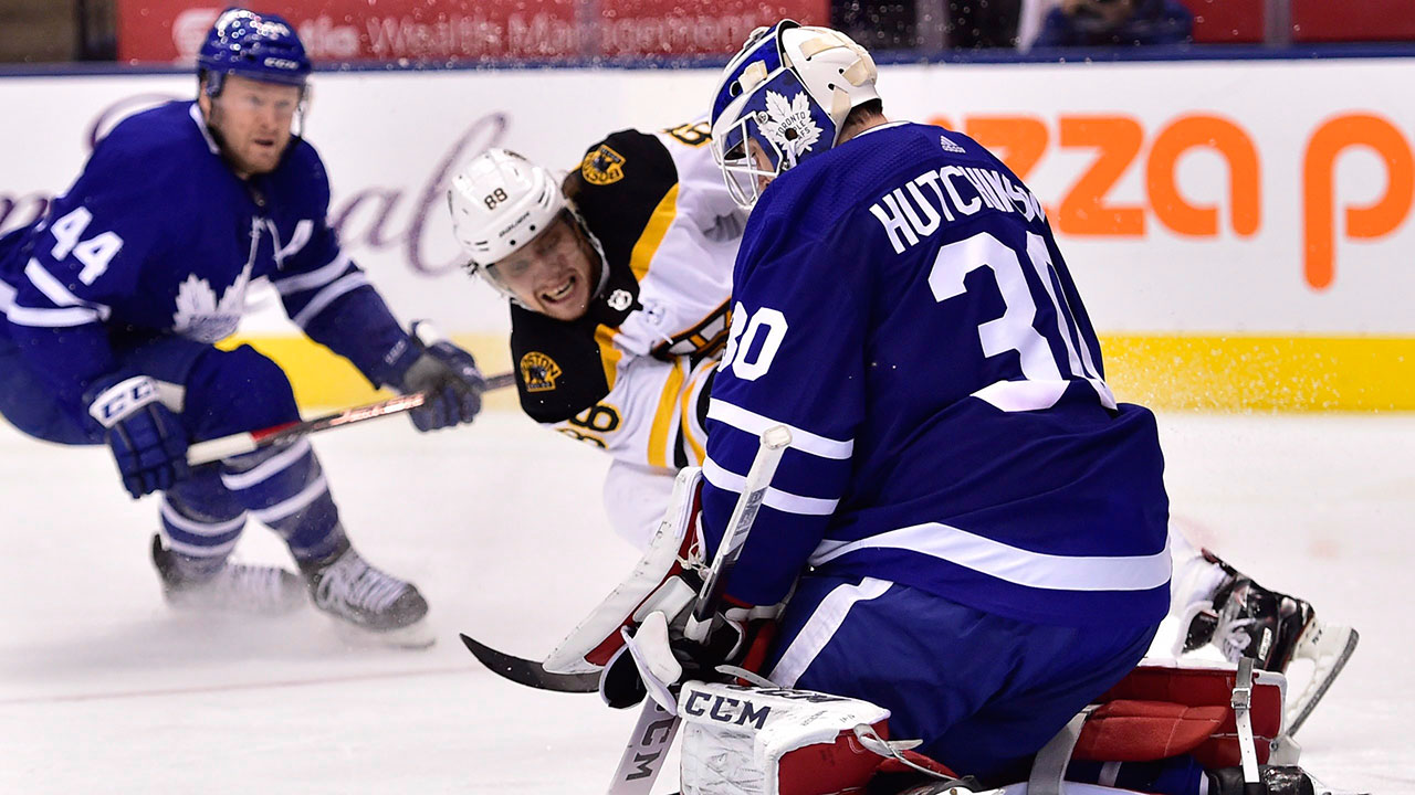 NHL-Bruins-Pastrnak-shoots-against-Maple-Leafs
