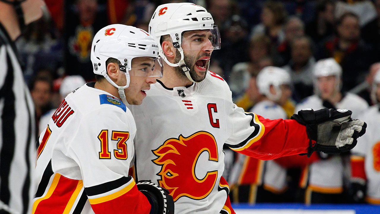 NHL-Flames-Gaudreau-celebrates-goal-with-Giordano