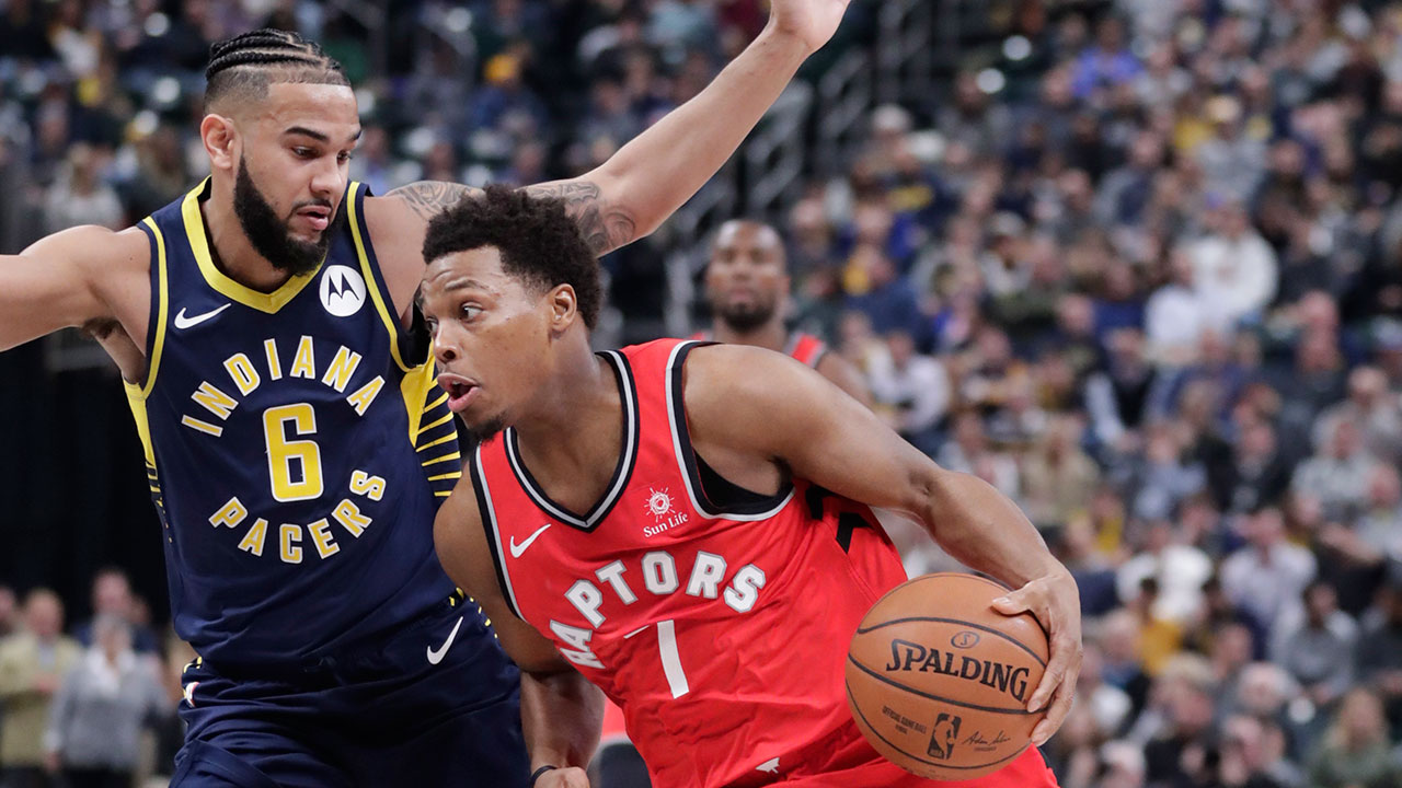 kyle-lowry-drives-past-cory-joseph