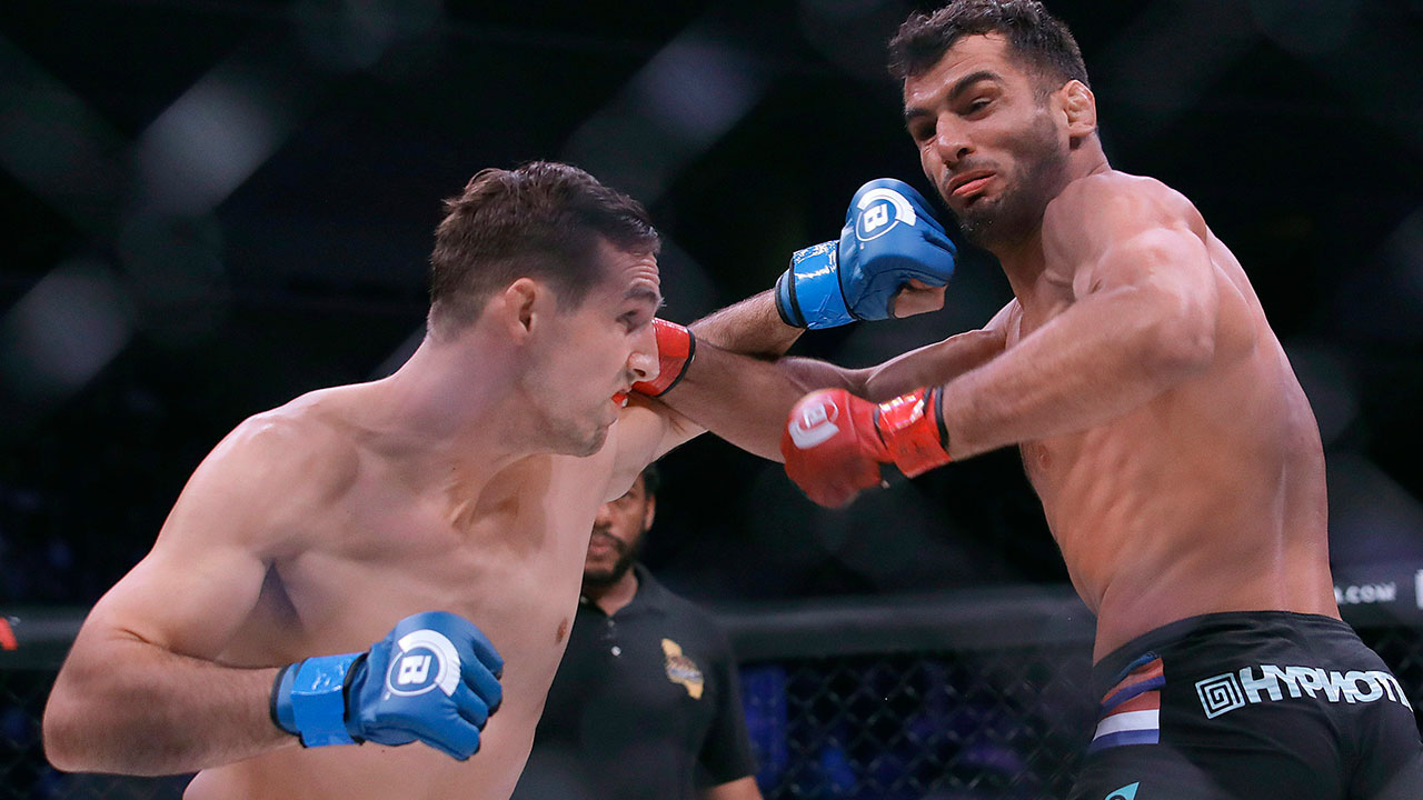 rory-macdonald-punches-gegard-mousasi-in-bellator-mma-fight