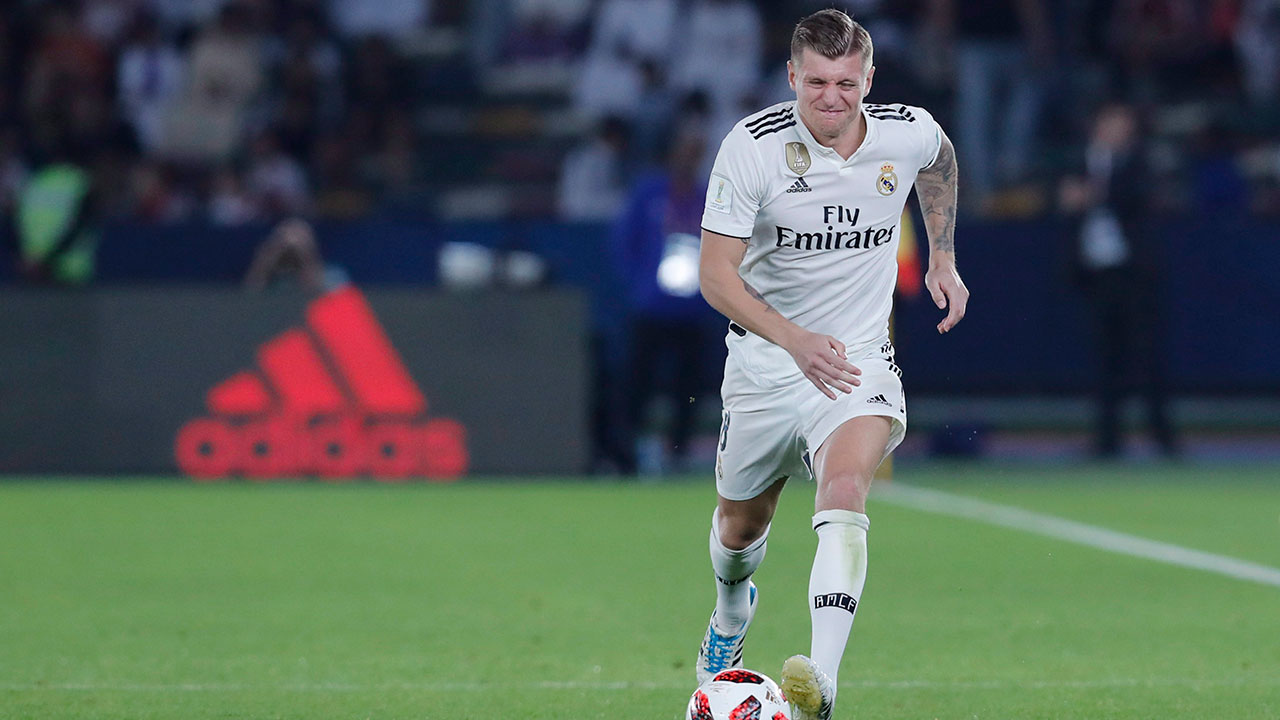 Real Madrid's midfielder Toni Kroos runs with the ball during the Club World Cup final soccer match between Real Madrid and Al Ain at Zayed Sport City in Abu Dhabi, United Arab Emirates, Saturday, Dec. 22, 2018. (Hassan Ammar/AP)