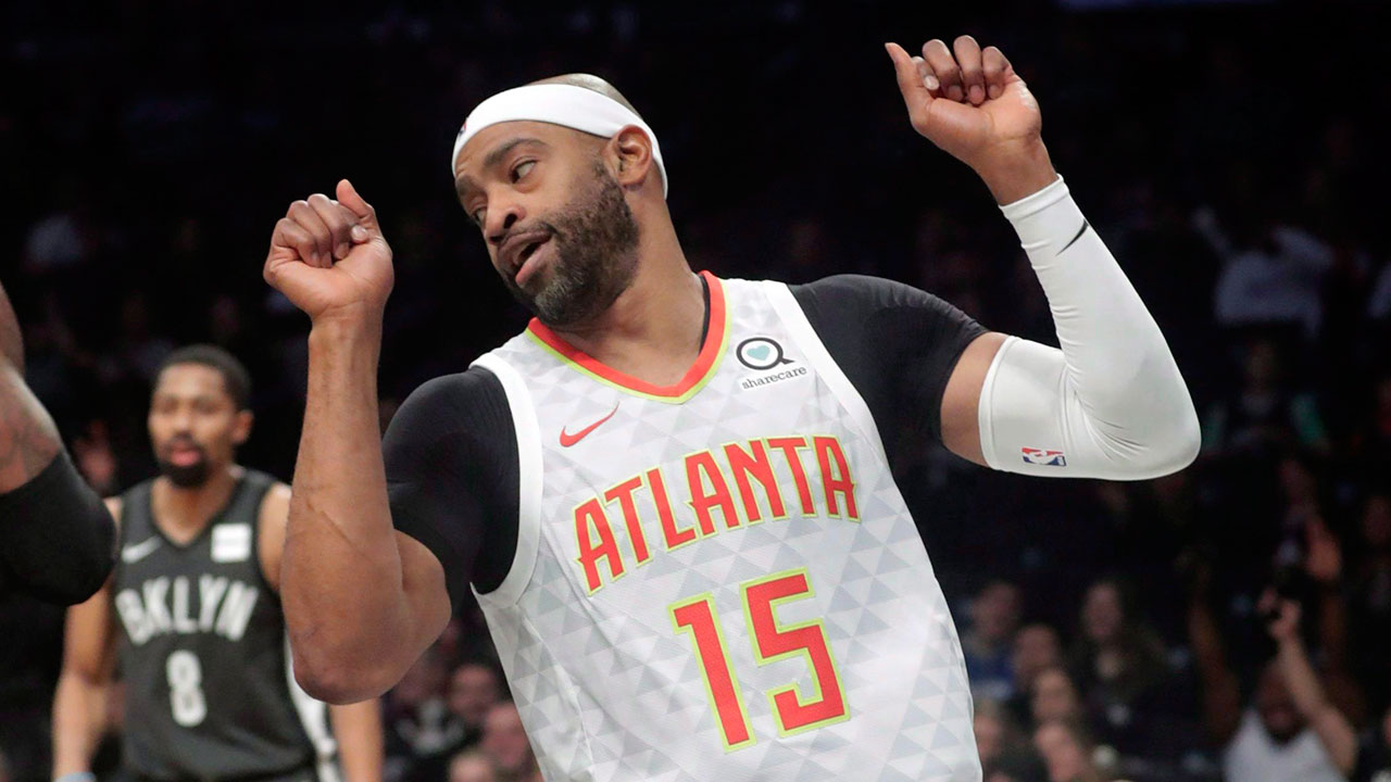 Vince Carter becomes first NBA player to play in four separate