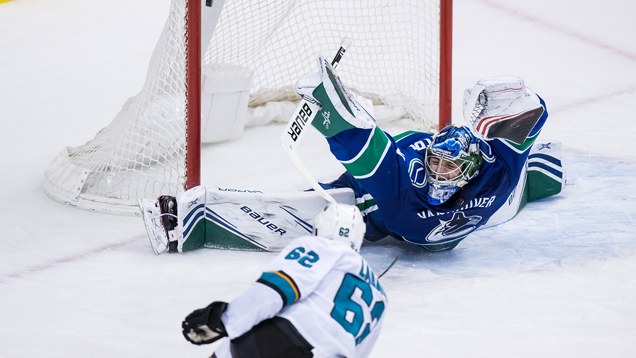 Sharks crush Canucks in Michael DiPietro's NHL deb