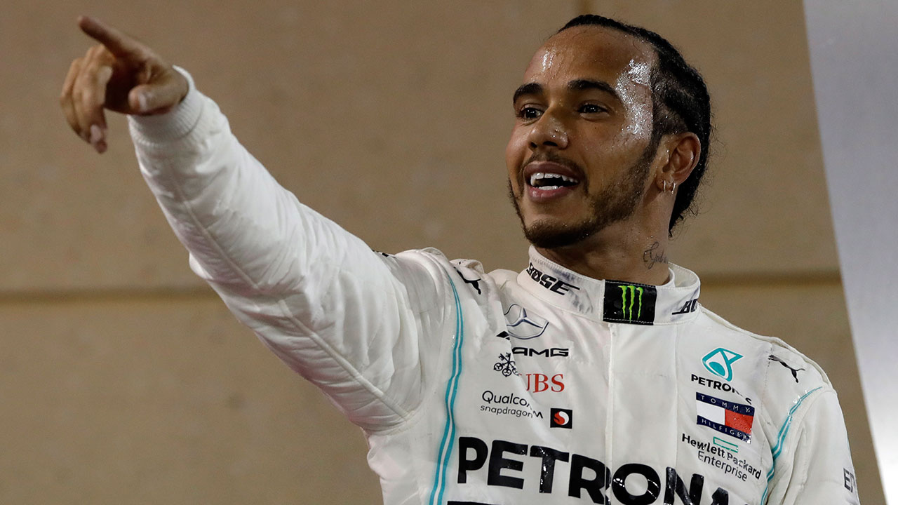 Auto-racing-Hamilton-celebrates-after-winning-Bahrain-Formula-One