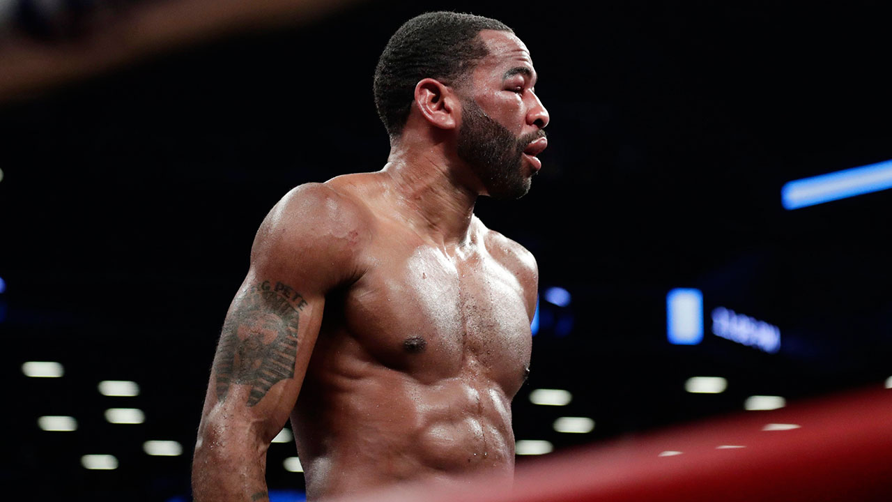 Lamont-Peterson-stands-after-loss