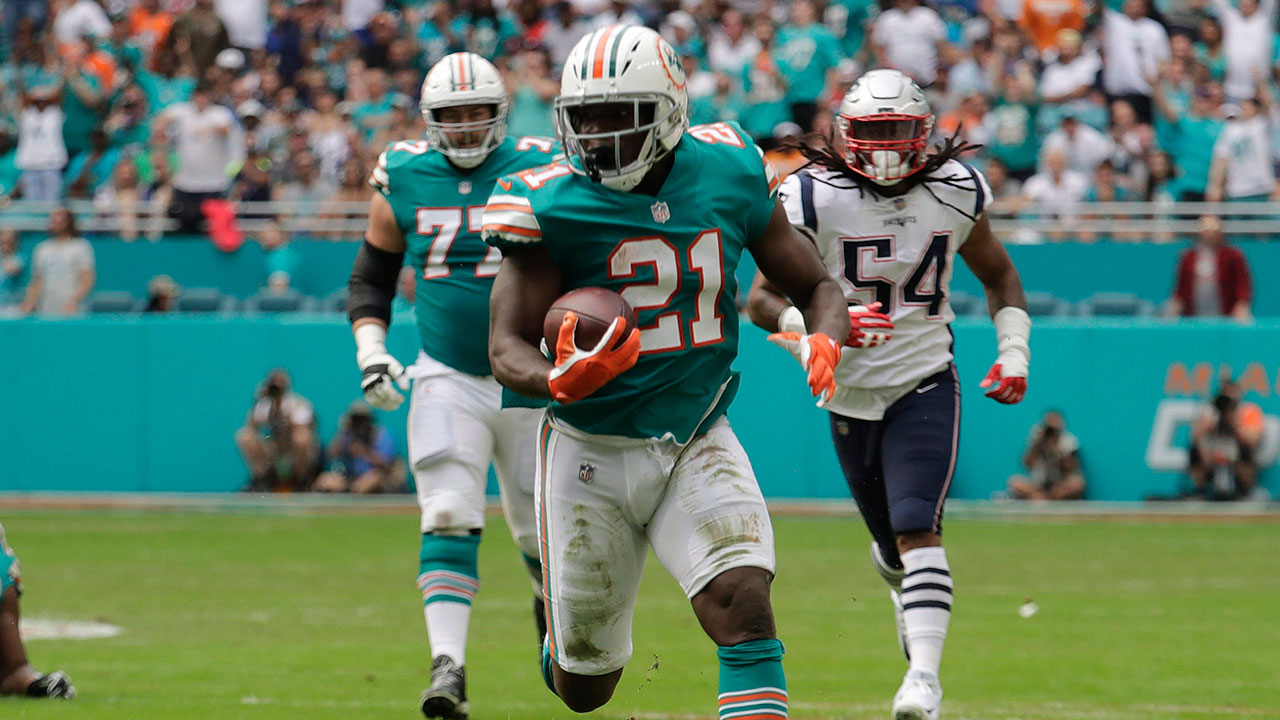 NFL-Gore-runs-ball-against-Patriots