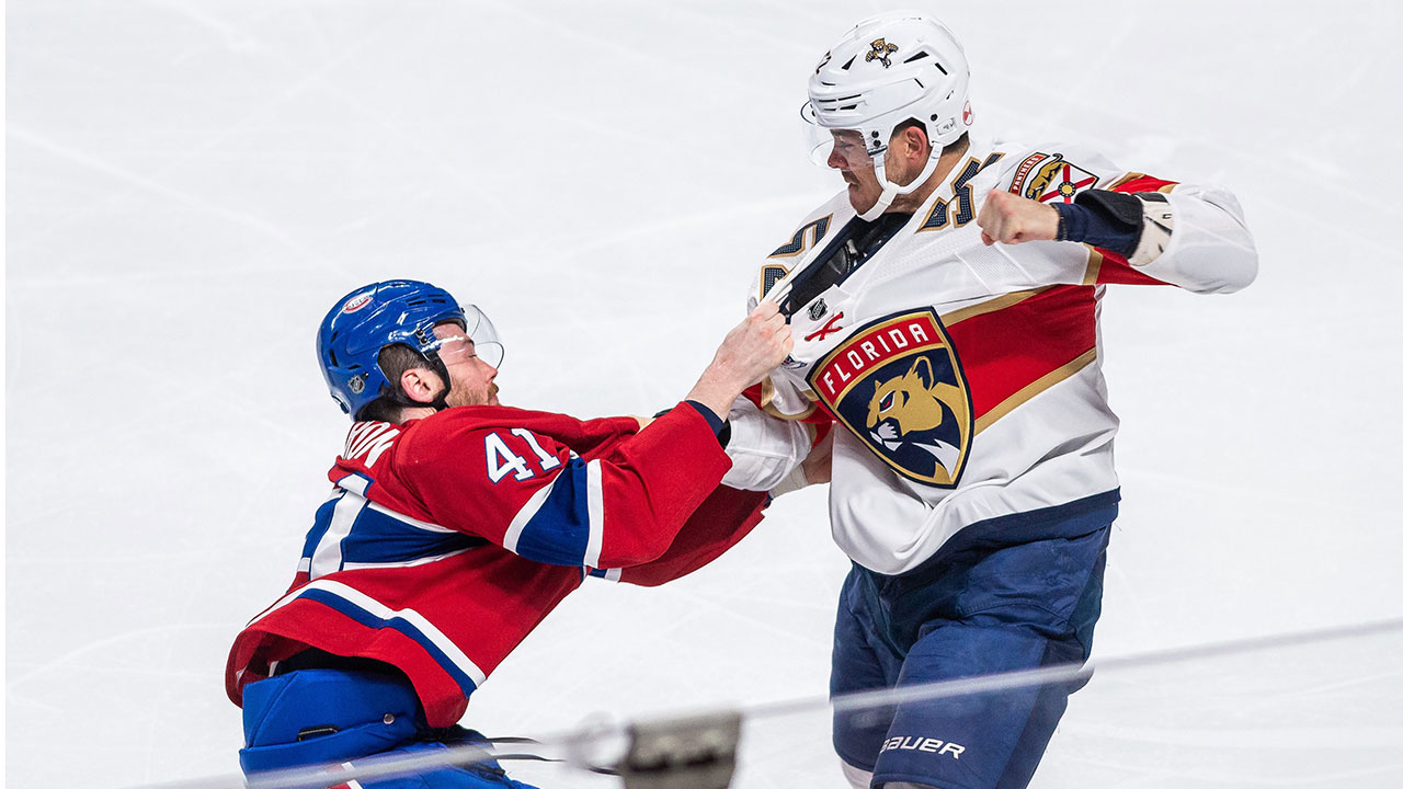 Montreal Canadiens left winger Paul Byron (41) fights with Florida Panthers defenceman MacKenzie Weegar (52). (Matt Garies/CP)