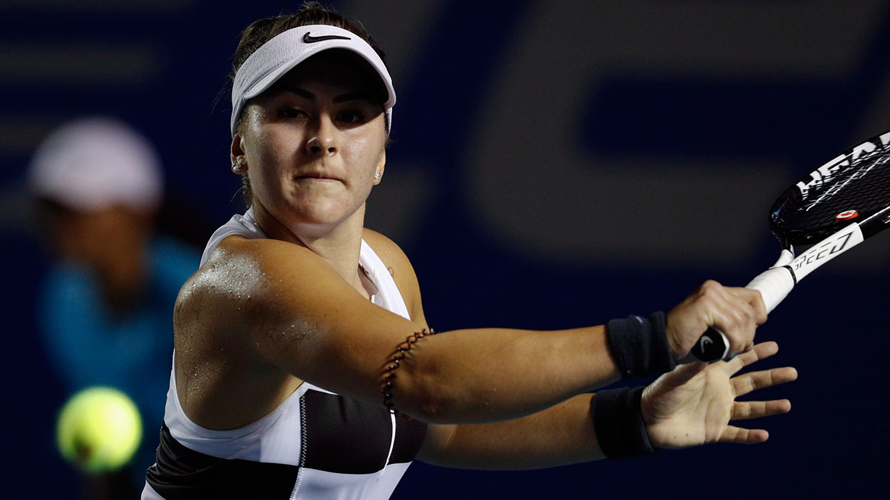 Tennis-Andreescu-returns-shot