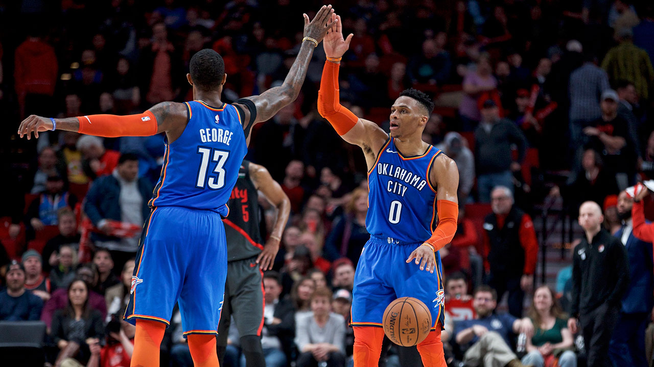 russell-westbrook-and-paul-george-high-five-each-ther