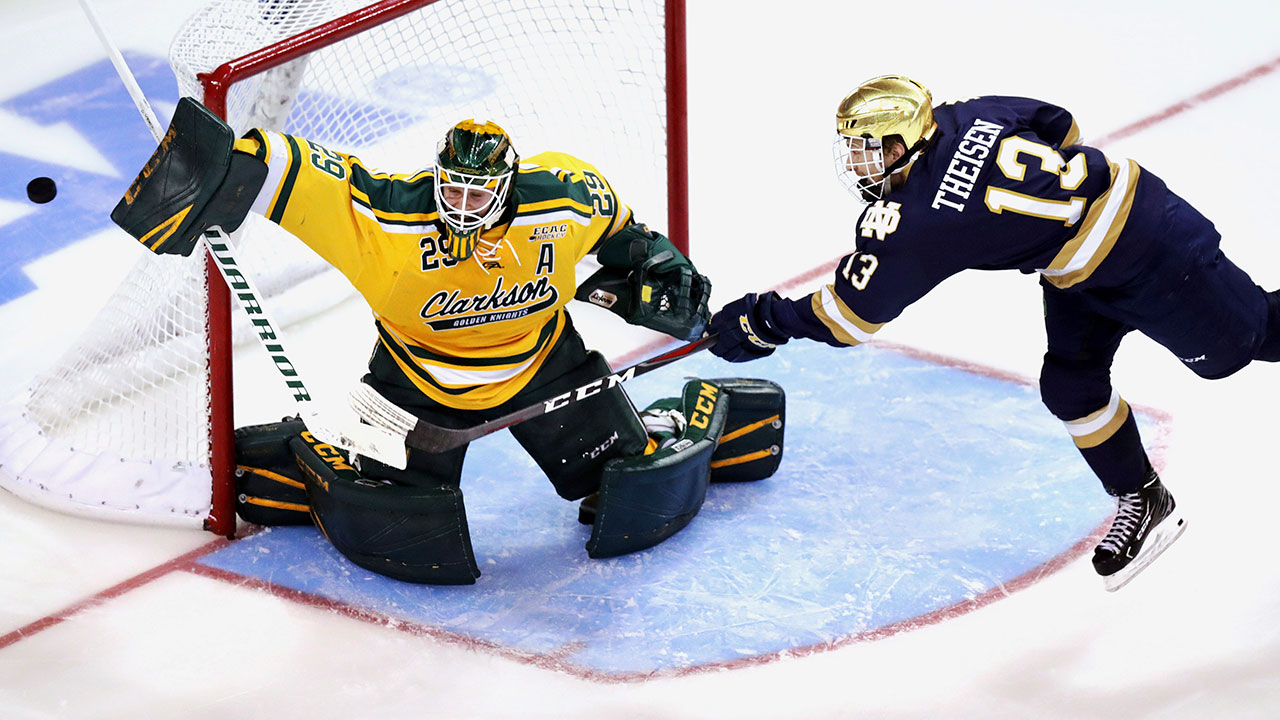 Clarkson goaltender Jake Kielly (29) makes a save on a shot by Notre Dame forward Colin Theisen (13) during the second period of an NCAA Division I men's ice hockey regional game. (Charles Krupa/AP)