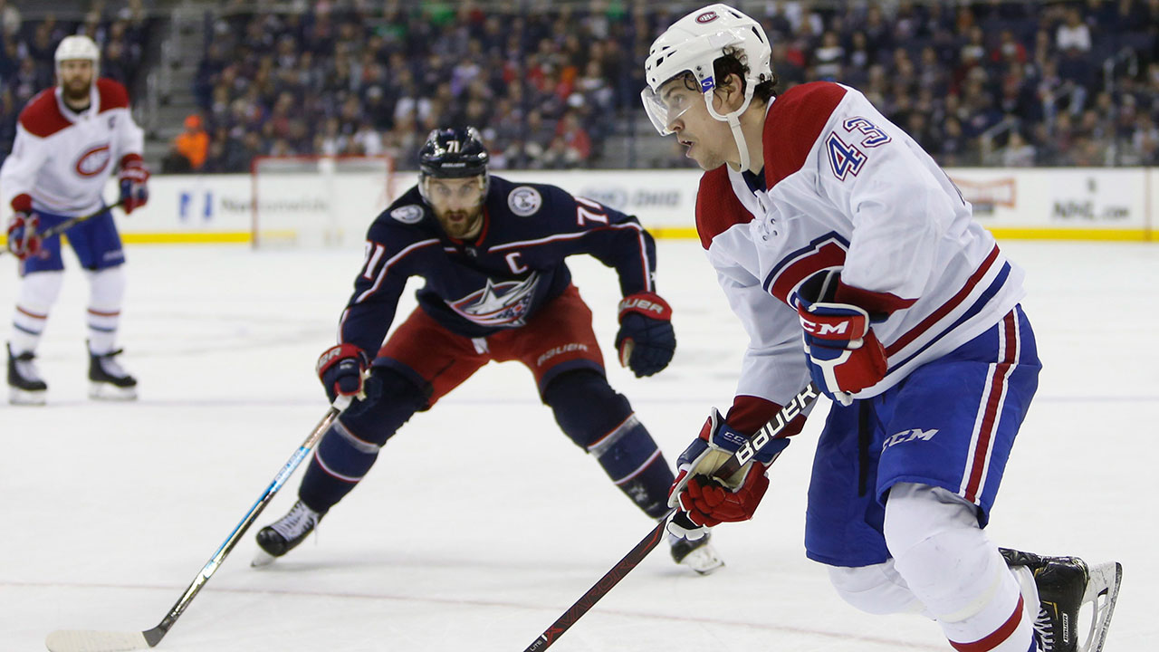 Montreal Canadiens' Jordan Weal, right, tries to skate past Columbus Blue Jackets' Nick Foligno. (Jay LaPrete/AP)