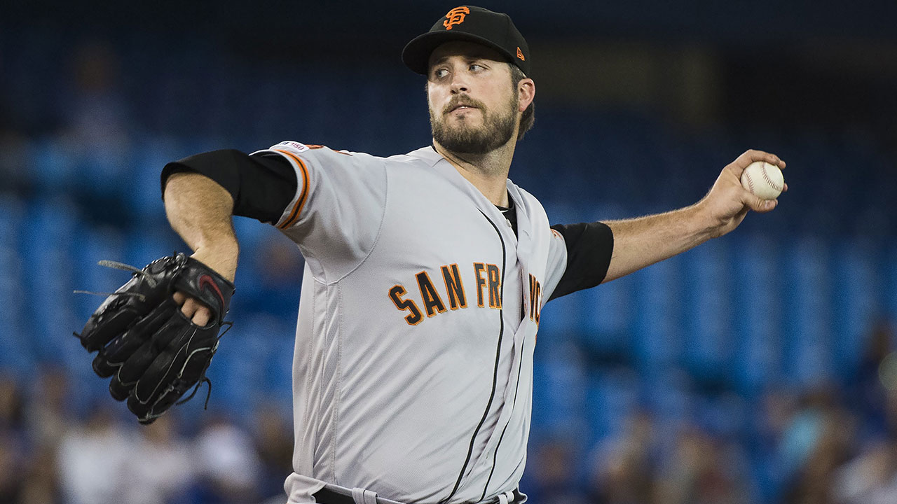 MLB-Giants-Pomeranz-throws-against-Blue-Jays