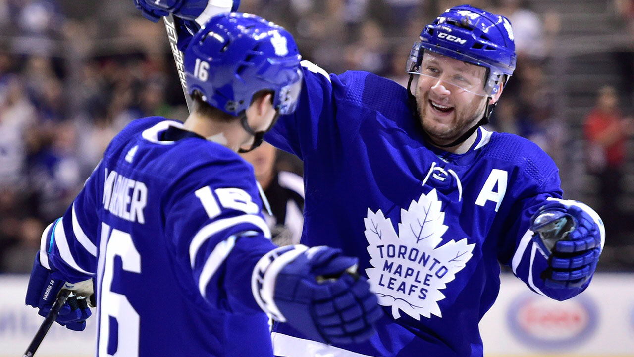 NHL-Maple-Leafs-Rielly-celebrates-goal-with-Marner
