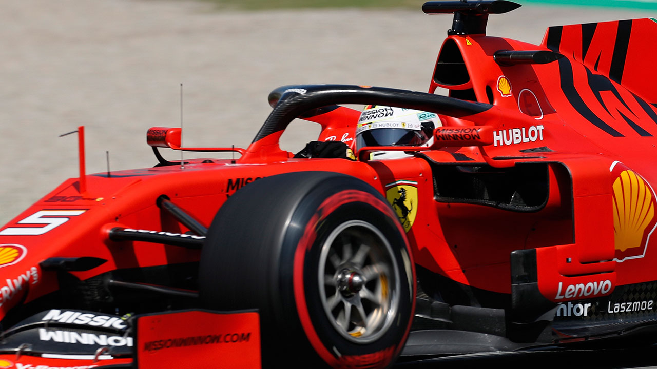 Auto-racing-Vettel-steers-Ferrari-during-qualifying-session