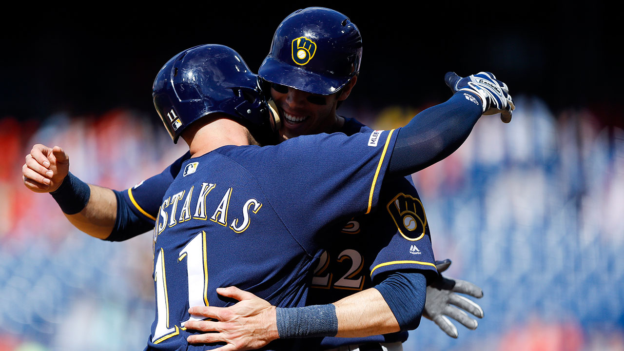 MLB-Brewers-Yelich-celebrates-with-Moustakas-after-home-run