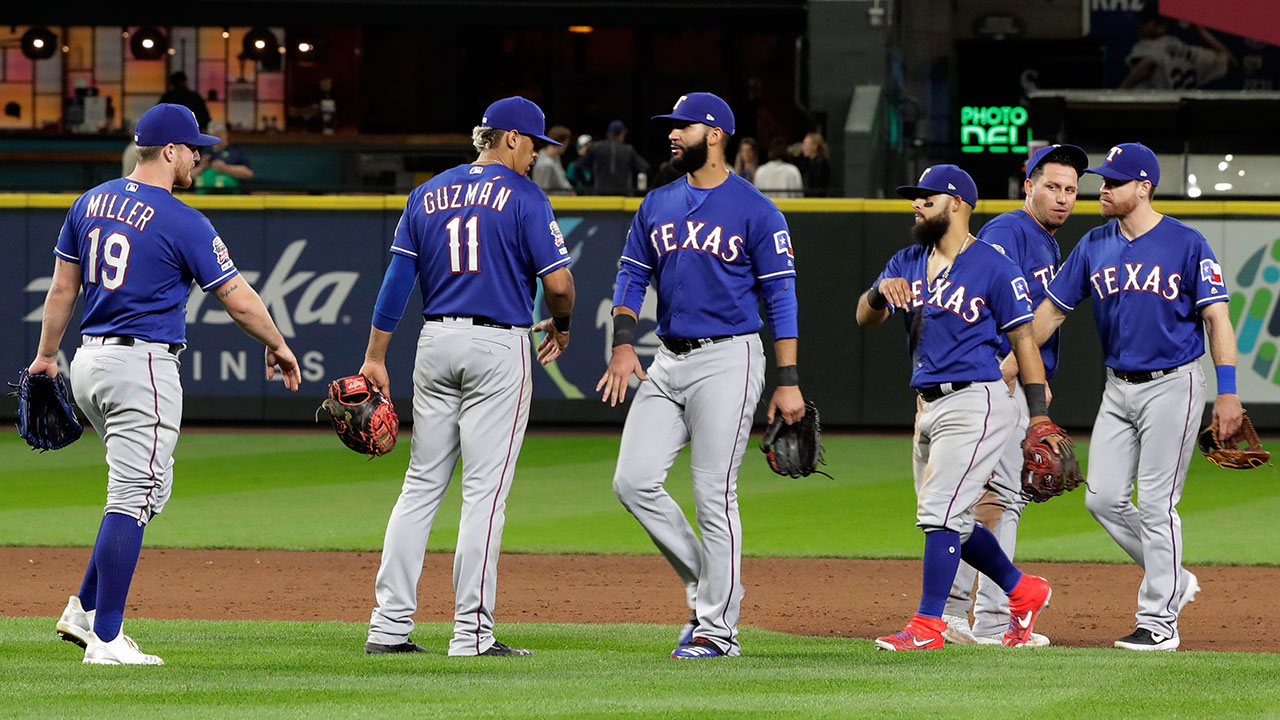 MLB-Rangers-players-celebrate-after-win