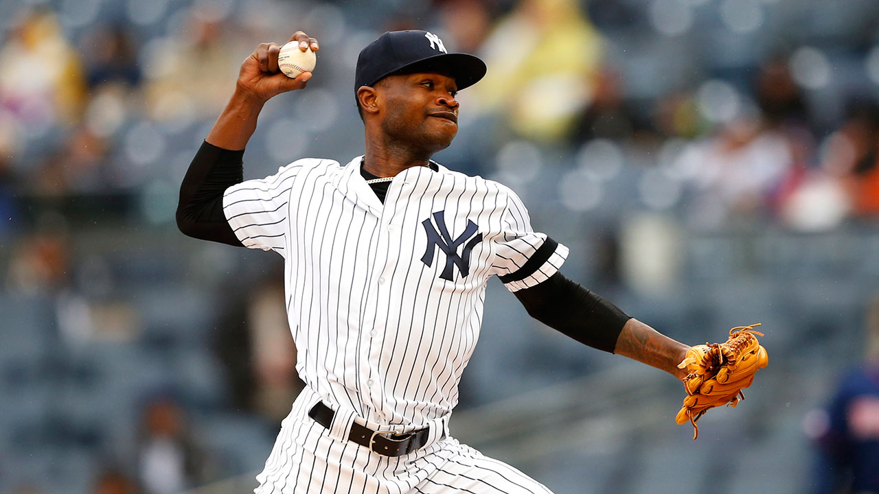 New York Yankees' starting pitcher Domingo German delivers against the Minnesota Twins. (Noah K. Murray/AP)
