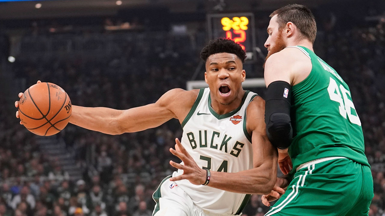 NBA-Bucks-Giannis-drives-against-Celtics