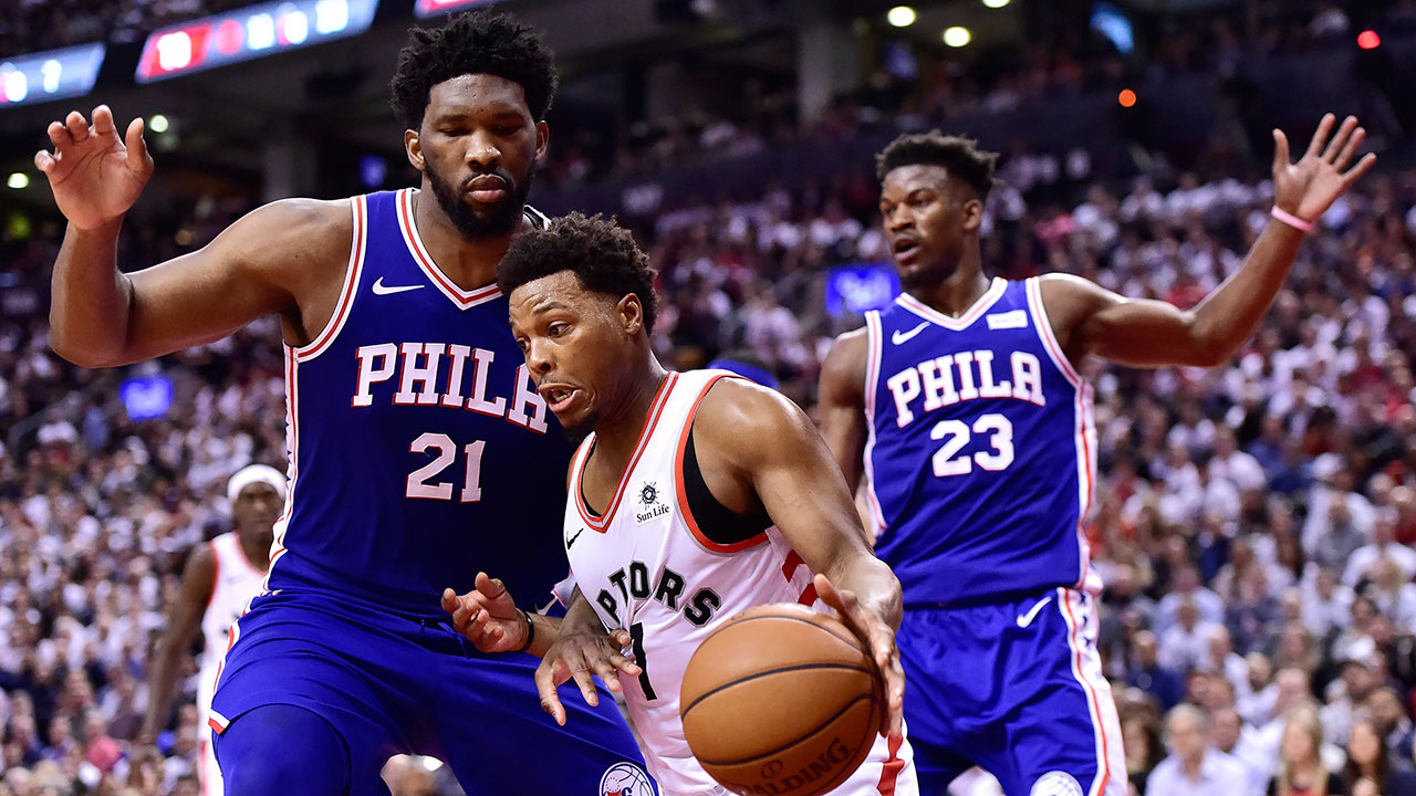 NBA-Raptors-Lowry-drives-against-76ers