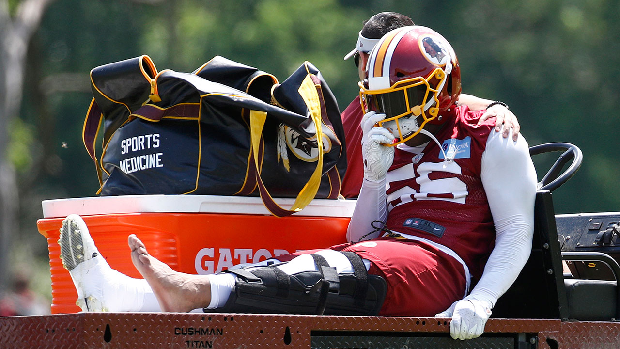 NFL-Redskins-Foster-carted-off-field