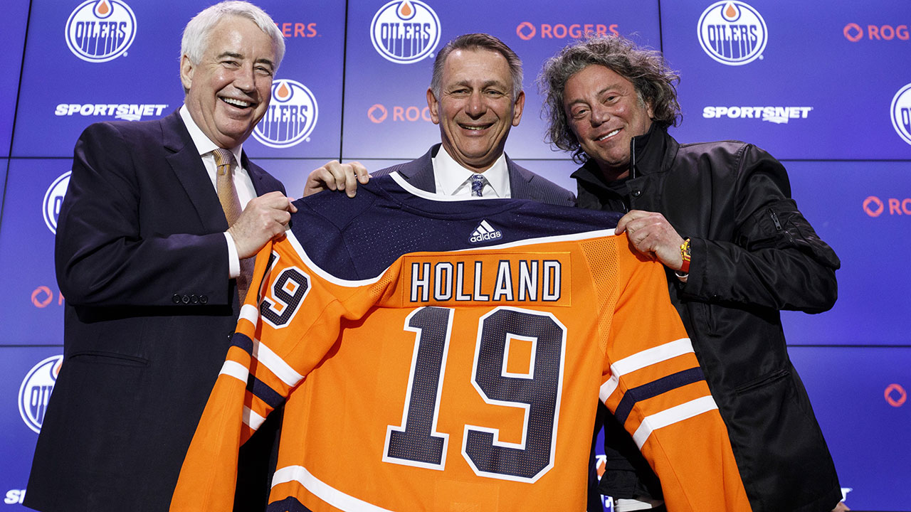 NHL-Oilers-Holland-poses-at-press-conference
