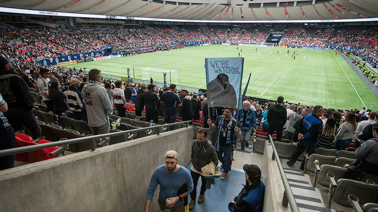 Soccer-MLS-Whitecaps-fans-leave-seats