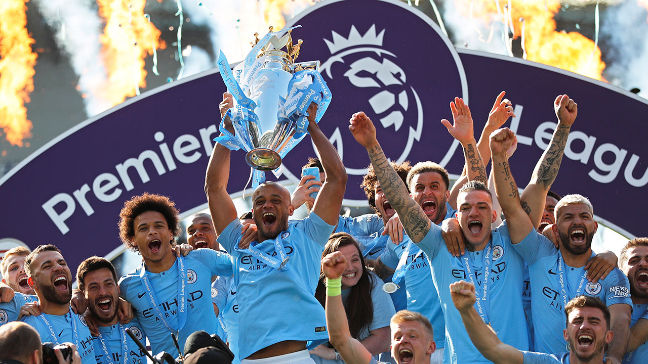 Soccer-Man-City-lifts-Premier-League-trophy