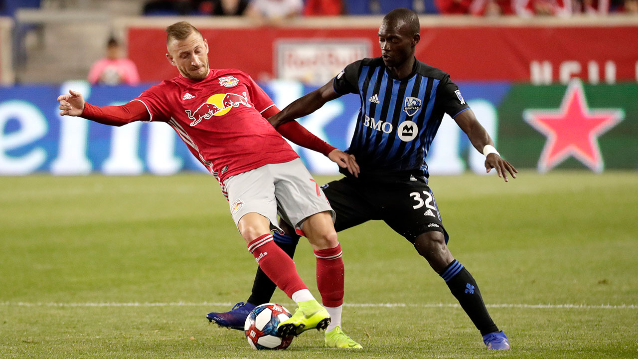 Soccer-Red-Bulls-Royer-tries-controlling-ball-against-Impact