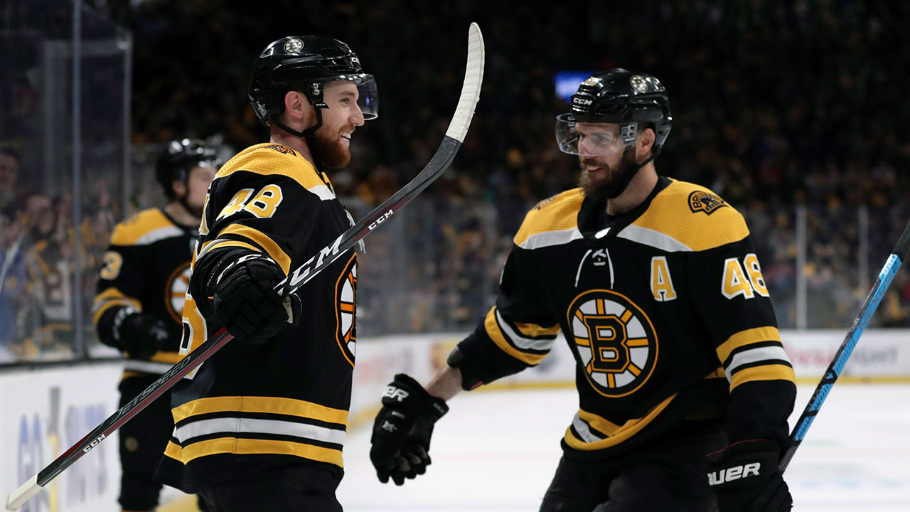 Grzelcyk strikes twice, Bruins down Hurricanes to 