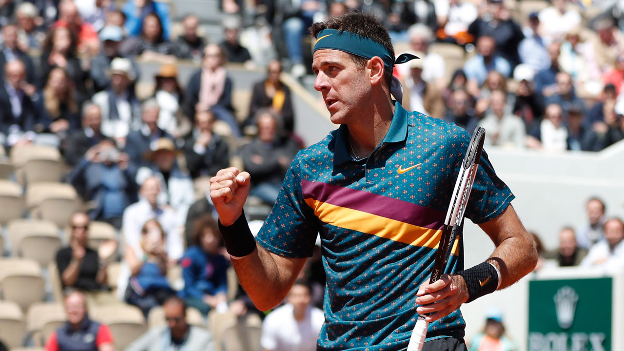Argentina's Juan Martin del Potro celebrates winning his first round match of the French Open tennis tournament against Chile's Nicolas Jarry in four sets, 3-6, 6-2, 6-1, 6-4, at the Roland Garros stadium in Paris. (Pavel Golovkin/AP)