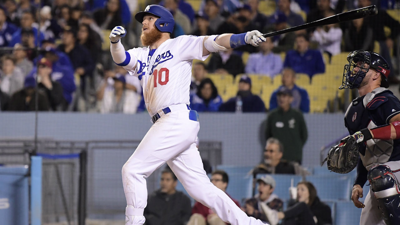 Los Angeles Dodgers' Justin Turner watches his three-run home run in front of Atlanta Braves catcher Tyler Flowers during the eighth inning of a baseball game Tuesday, May 7, 2019, in Los Angeles. This was Turner's third home run of the game. (Mark J. Terrill/AP)