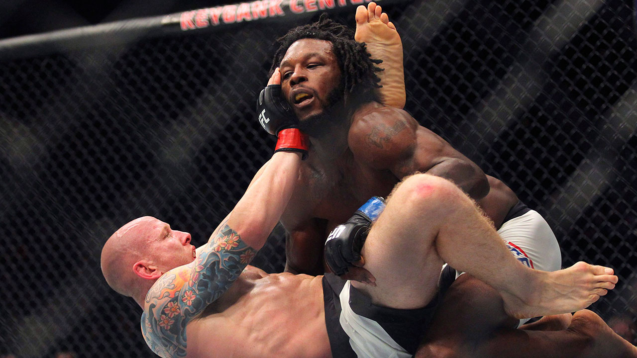 Josh-Emmett-taken-down-by-Desmond-Green-at-UFC-210