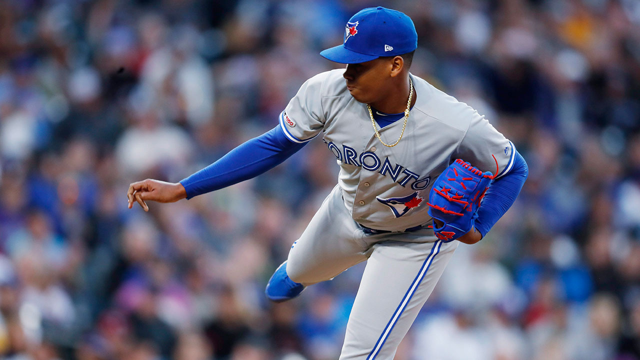 MLB-Blue-Jays-Luciano-throws-against-Rockies