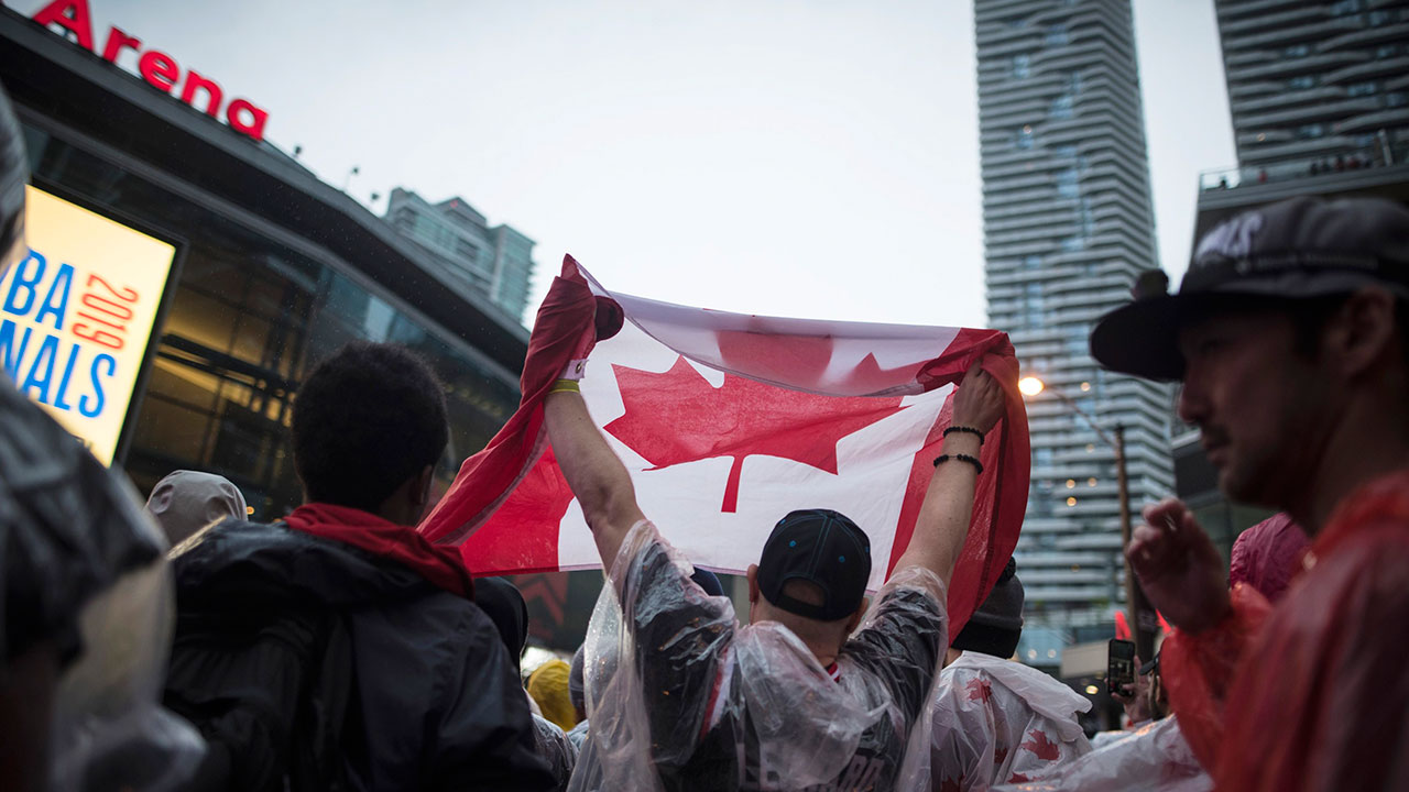 NBA-Raptors-fans-cheer-outside-Scotiabank-Arena