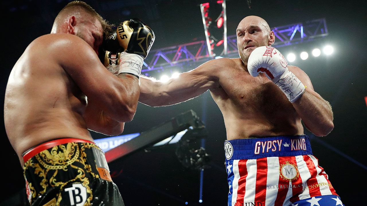 Tyson-Fury-punches-Tom-Schwarz