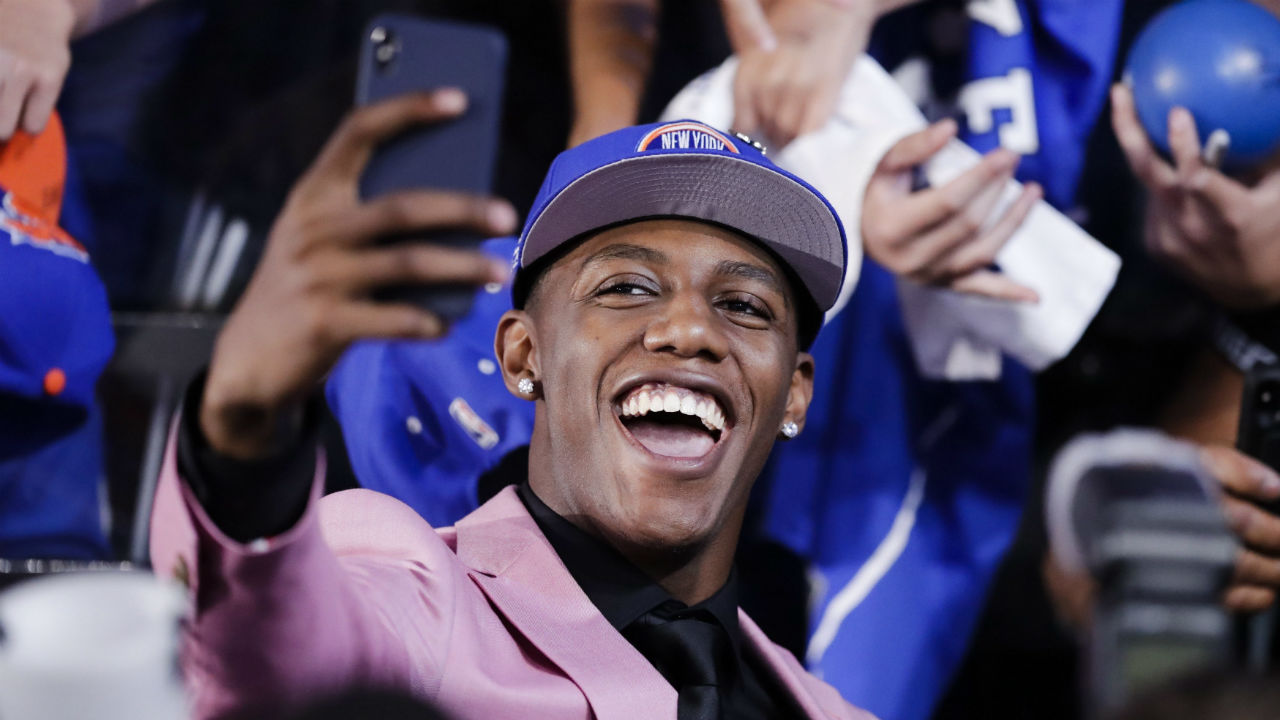 RJ Barrett poses for selfies with fans after he was selected by the New York Knicks at the NBA basketball draft Thursday, June 20, 2019, in New York. Barrett was selected third overall. (Julio Cortez/AP)