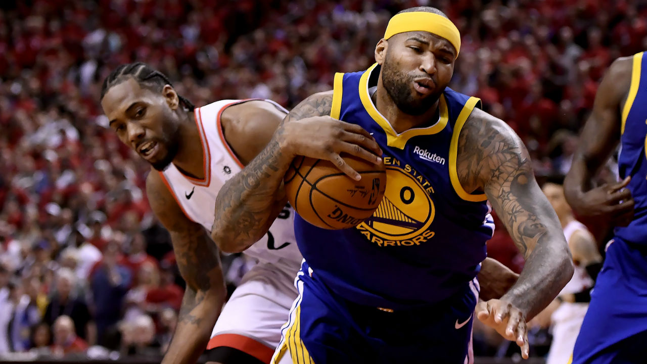 Toronto-Raptors-forward-Kawhi-Leonard-(2)-pushes-off-Golden-State-Warriors-centre-DeMarcus-Cousins-(0)-during-second-half-basketball-action-in-Game-5-of-the-NBA-Finals-in-Toronto-on-Monday,-June-10,-2019.-(Frank-Gunn/CP)