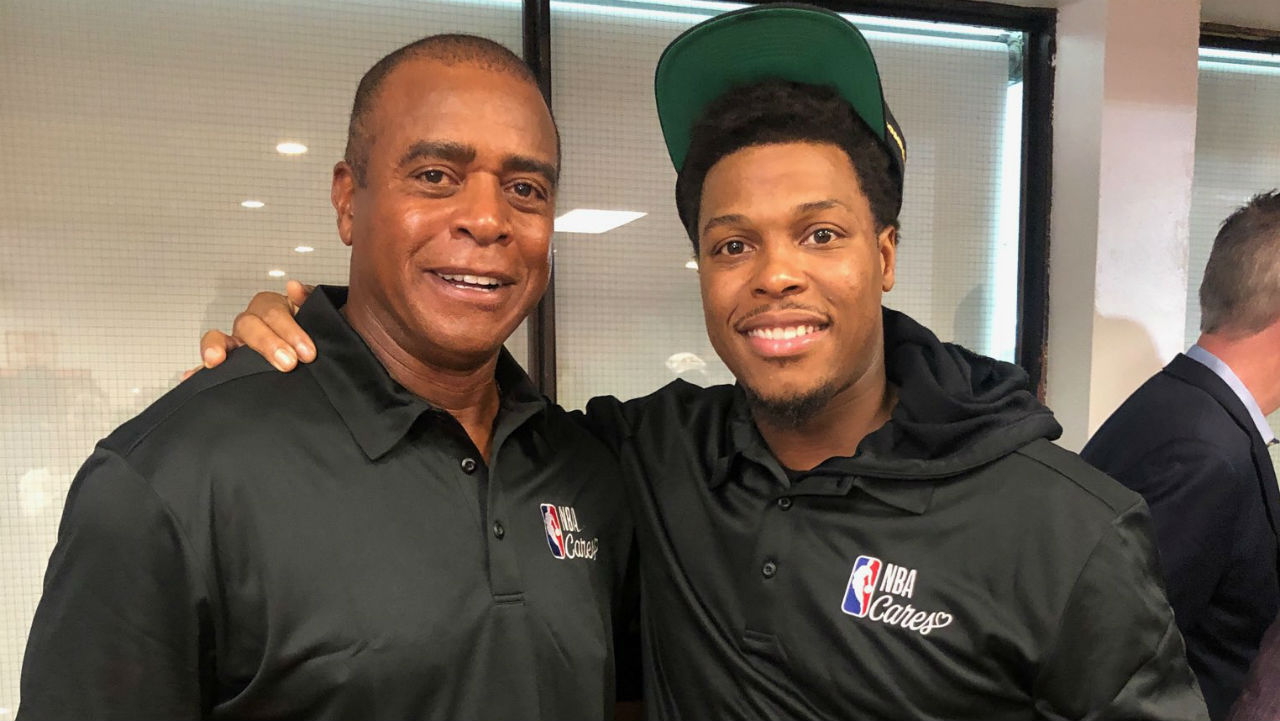Ahmad-Rashad-and-Kyle-LOwry-attend-an-NBA-Cares-Event-in-Toronto-during-the-2019-NBA-Finals.