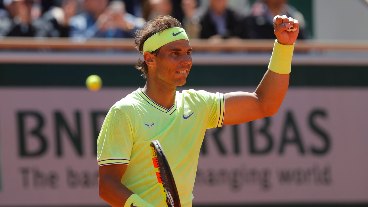 Spain's Rafael Nadal celebrates winning. (Michel Euler/AP)