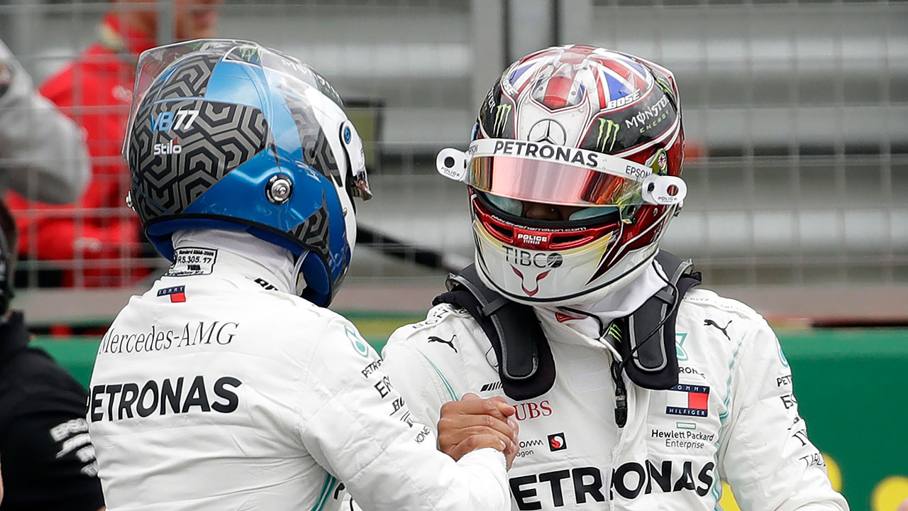 Auto-racing-Bottas-talks-to-Hamilton