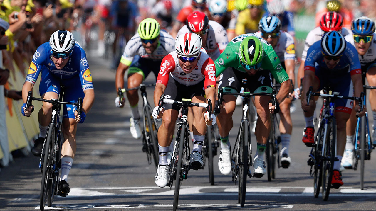 Australia's Caleb Ewan, centre, sprints to win the sixteenth stage of the Tour de France. (Thibault Camus/AP)