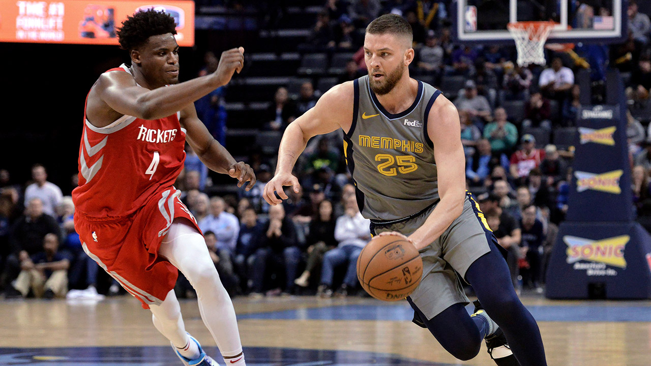 grizzlies-chandler-parsons-drives-against-rockets