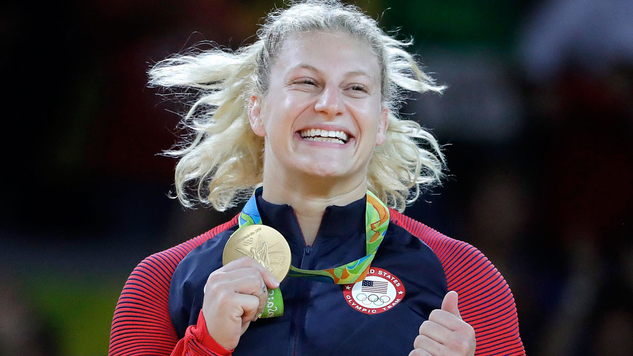 kayla-harrison-with-her-olympic-gold-medal