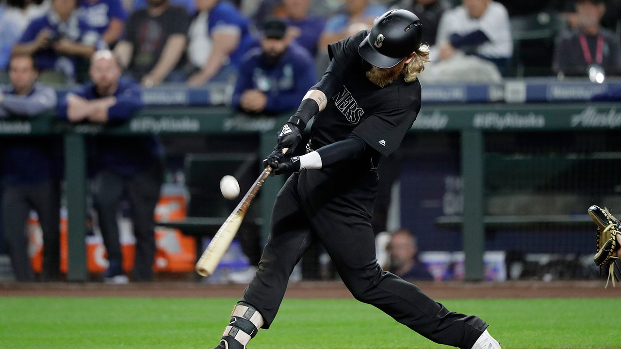 Seattle Mariners' Jake Fraley pops out during the fourth inning. (Ted S. Warren/AP)