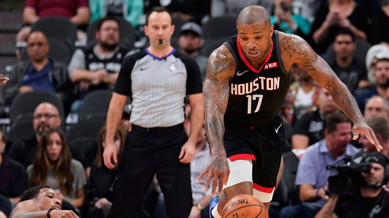 NBA-Rockets-Tucker-dribbles-against-Spurs