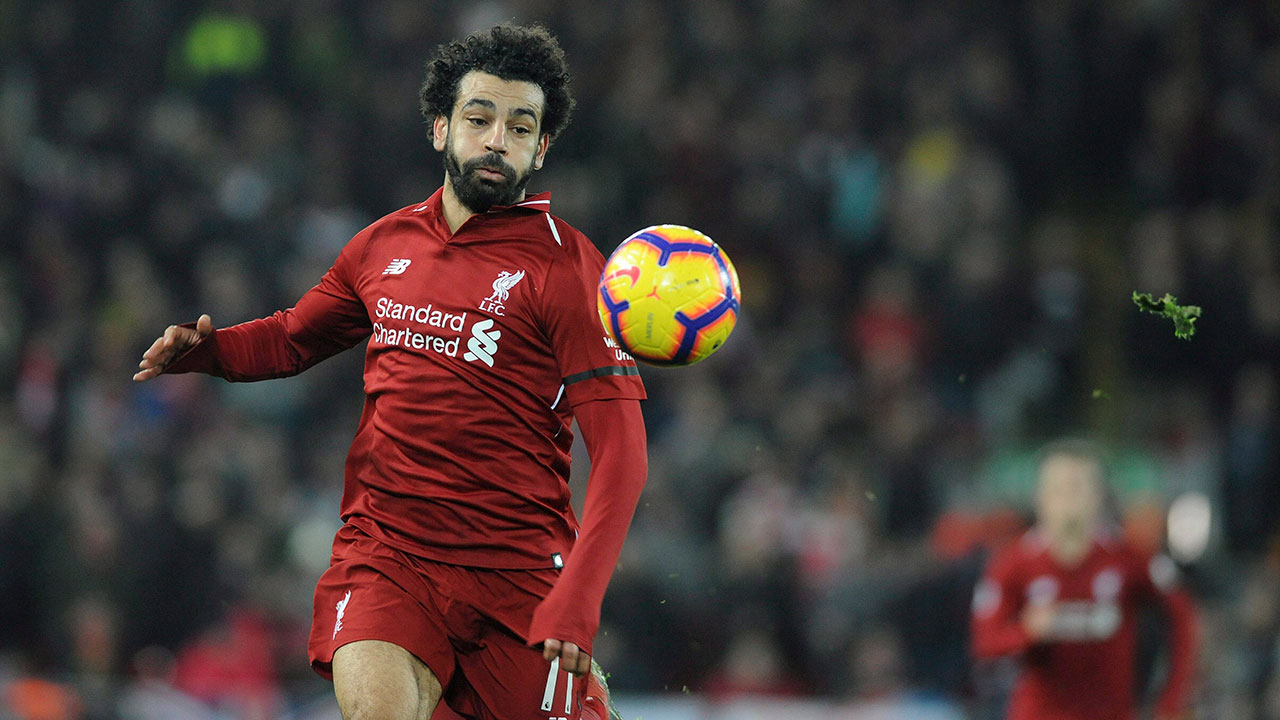 Liverpool's Mohamed Salah looks to control the ball during the Premier League match between Liverpool and Arsenal at Anfield in Liverpool, England, Saturday, Dec. 29, 2018. (Rui Vieira / AP)