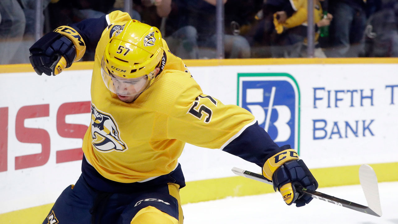 Nashville Predators defenseman Dante Fabbro celebrates after scoring a goal against the Chicago Blackhawks during the second period of an NHL hockey game. (Mark Humphrey/AP)
